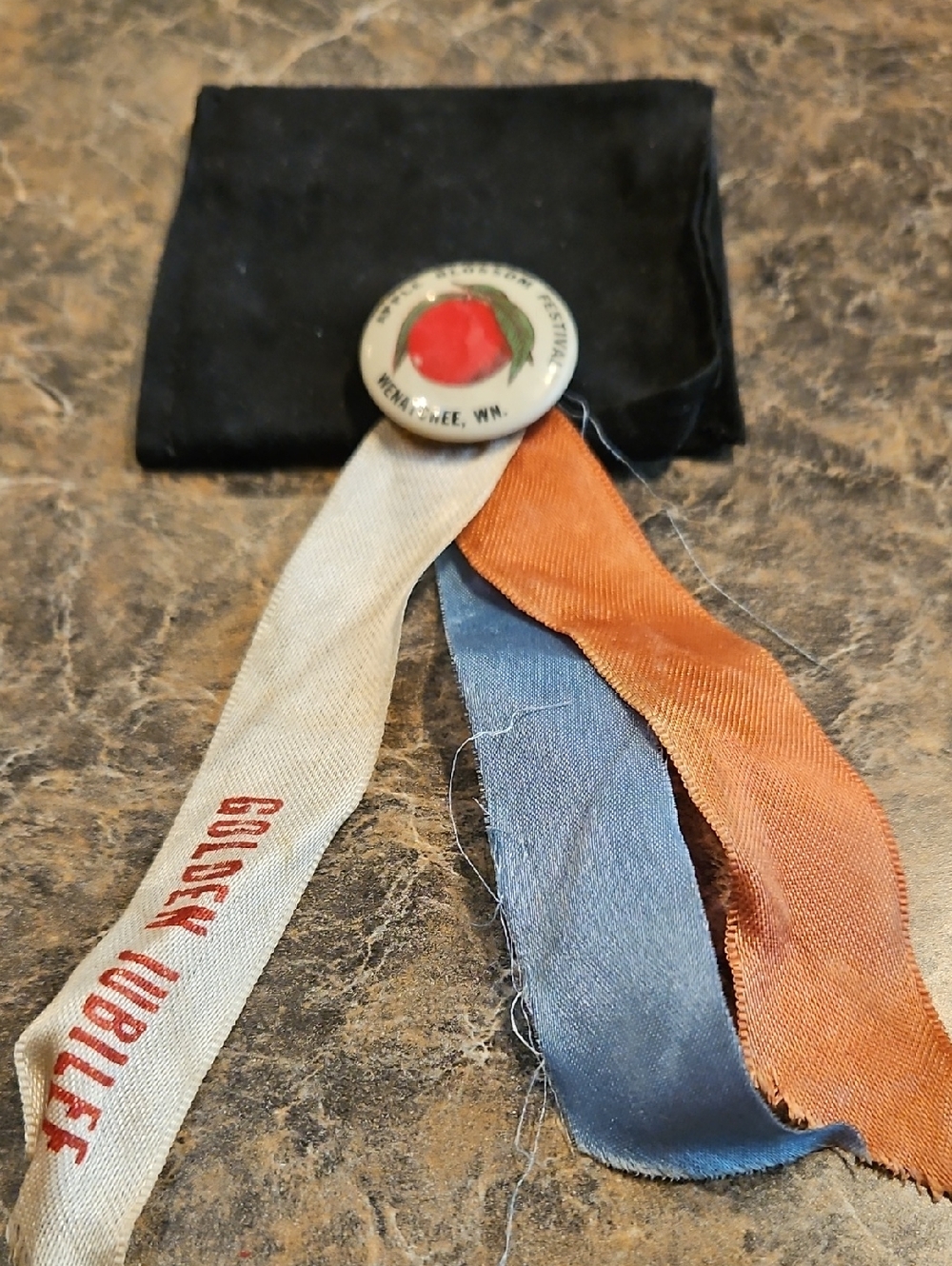 Vintage Ribbon Badge with Red Peach Graphic and Multicolor Ribbons